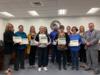 The wellness committee and local community partners were recognized for their participation in hosting the 3rd annual Jingle Bell Jog for OCSB employees and their families.