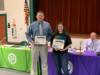Students were recognized for winning the booklet cover design contest.